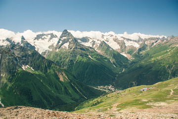 Mountain summer landscape with forest and high peaks. Caucasus.