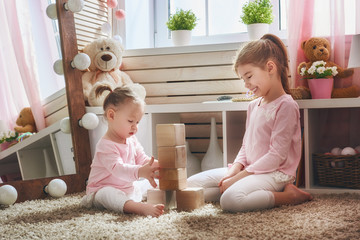 children are playing with blocks