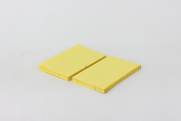 Yellow card on a white background.