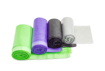 Plastic garbage bags in rolls of different sizes and colors