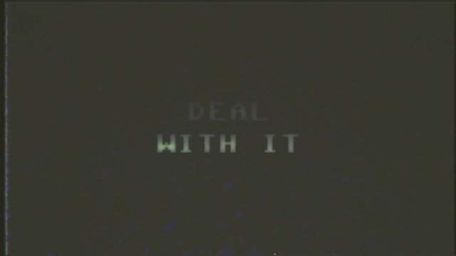 A fake VHS screen showing the text Game over - Deal with it. 8 bit retro style.
