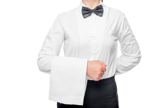 torso of waitress in a white shirt with a towel on his hand clos