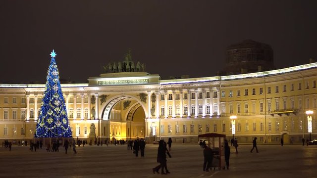 Winter Palace Square and General Staff Building. Christmass tree. New year. St. Petersburg, Russia. Night, city illumination, lights. Cinematic 4k footage. Panorama. Best tourist attraction.