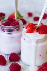 Homemade berry yogrut with strawberries and raspberries