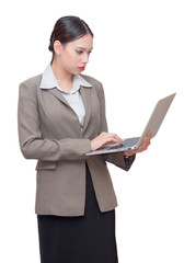 business woman Using a laptop in her hand isolate white background