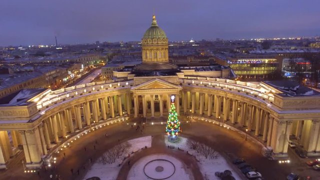 Kazan Cathedral  Russian Orthodox Church on the Nevsky Prospekt in Saint Petersburg. Night, city illumination, lights. Unique cinematic 4k drone footage. Flight over. Panorama. Aerial