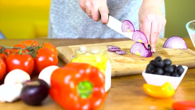 preparing fresh ceasar salad