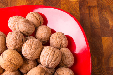 walnuts in red plate