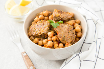 chickpeas with meat with vegetables and greens