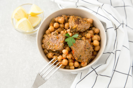 chickpeas with meat with vegetables and greens
