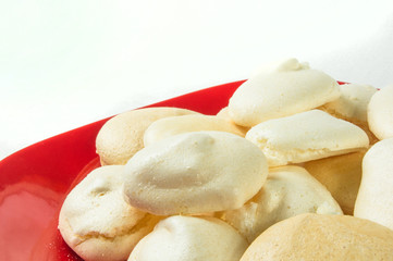 red plate with meringues