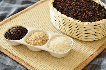 rice in Wicker baskets. on wooden table.