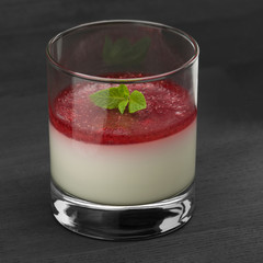 Strawberry dessert in a glass aspic