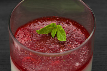 Strawberry dessert in a glass aspic