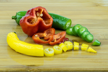 Hot peppers in red, green and yellow
