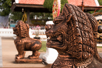Lion statues in temple Thailand