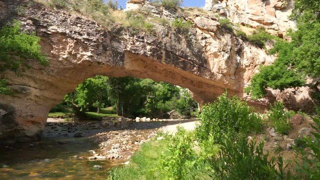 Beautiful blue skies above the river under rock butte at a Wyoming landmark