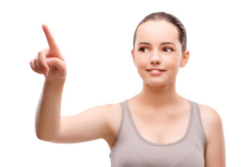 Young sports girl pressing virtual button isolated on white