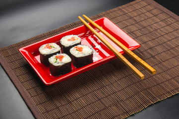 still life - set the rolls on a red plate