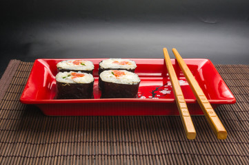 still life - set the rolls on a red plate