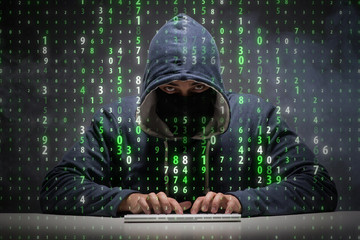Young hacker in data security concept