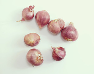 red onion bulb on white background