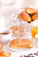 Breakfast with croissants. 