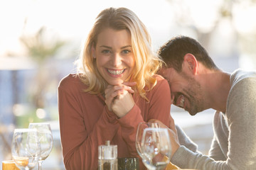 Young couple dating in restaurant