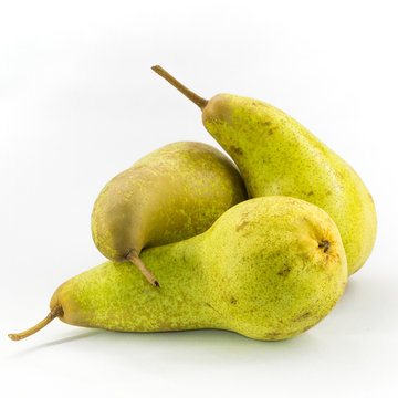 Three Abate Fetel pears isolated on white background.