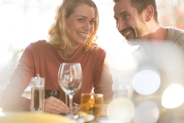 Young couple dating in restaurant