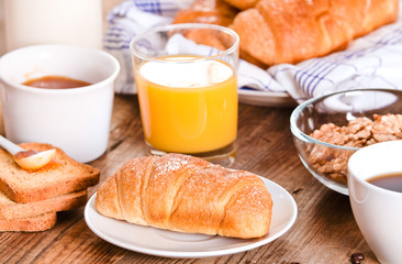 Breakfast with croissants. 