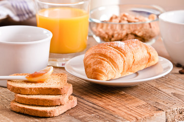 Breakfast with croissants. 
