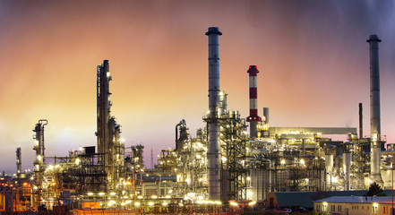 Obraz na płótnie Canvas Industry, Oil petrochemical plant at sunset