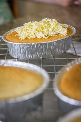 cake, making cakes, Close up cakes with cheddar cheese on top. cake on wooden background.