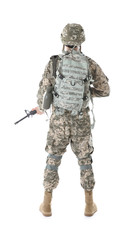 Fototapeta premium Soldier in camouflage holding rifle, isolated on white