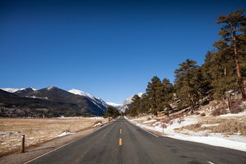Road in the Rocky Mountain National Park in winter, USA