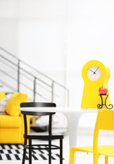 Modern living room interior with yellow furniture