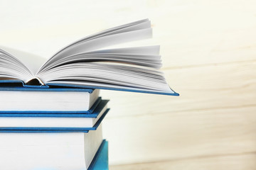 New books on wooden  background