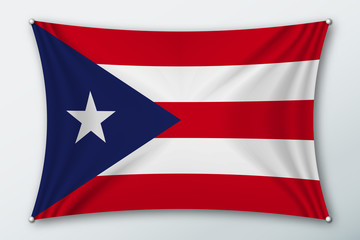 Puerto rico national flag. Symbol of the country on a stretched fabric with waves attached with pins. Realistic vector illustration.