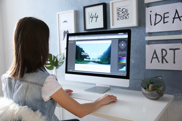 Woman working on computer at home
