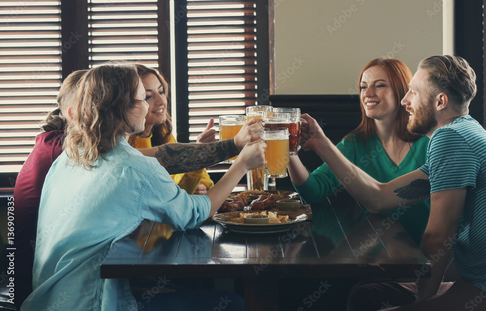 Wall mural People celebrating Saint Patrick's Day in pub