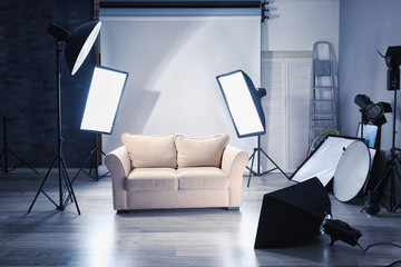 Fototapeta premium Photo studio with modern interior and lighting equipment
