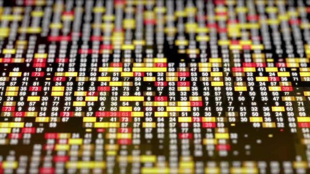 Computer animation of different combination of numbers randomly appearing and illuminated with red and yellow sections