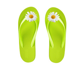 green beach shoes with chamomile flower isolated on white