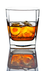  whiskey withl ice isolated on white background