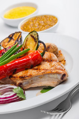 Steak seasoned with pepper and vegetables