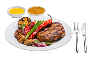 Steak seasoned with pepper and vegetables