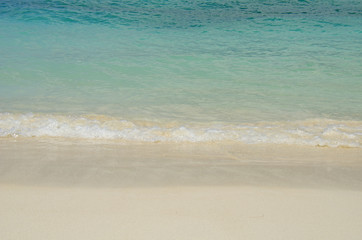 Fototapeta na wymiar blue water, white sand