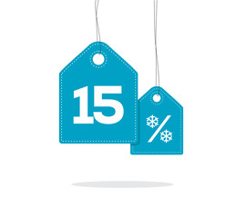 Obraz na płótnie Canvas Blue hanging price tag labels with 15% and snowflake percent design texts on them and with shadow isolated on white background. For winter sale campaigns.