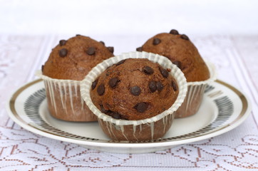 Muffins with chocolate on the plate